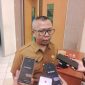 Ket. Foto: Kepala Bidang Peningkatan Prestasi Olahraga Dispora Kaltim, Rasman Rading.
