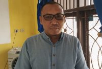 Kepala Desa Loa Raya, Martin,